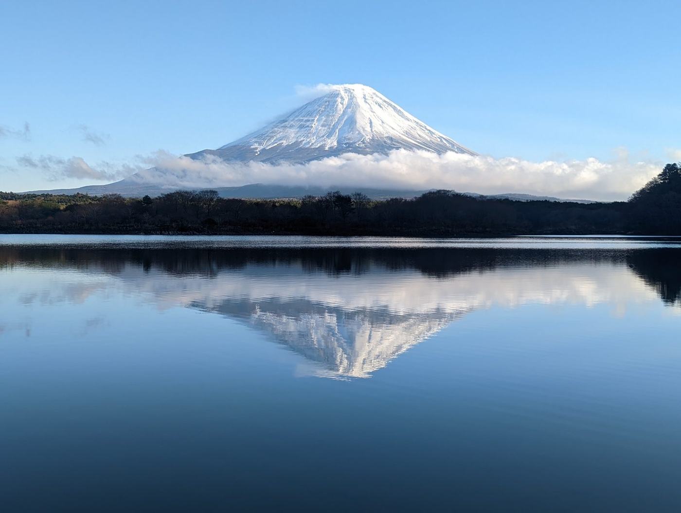 Mount Fuji reflected in the flat water of Lake Shojiko, photographed from Tatego-hama on one of our own trips